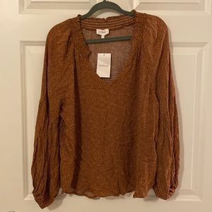 Long sleeve, flowered blouse